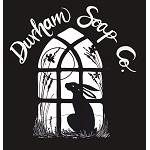 Durham Soap Company logo with a silhouette of a hare looking at the moon through a gothic window frame on a black background